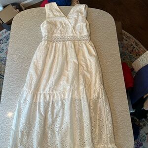 White eyelet dress. No tags, but dress has not been worn. Large size.
